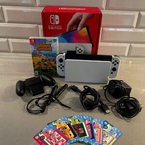 Nintendo Switch OLED LIKE NEW w/ box, animal crossing, & sanrio amiibo cards